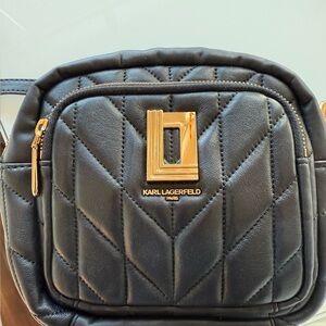 Beautiful everyday crossbody!! Super soft and great condition. Black and Gold!!